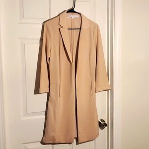 Long off pink blazer.